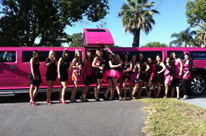 Hens Night Perth girls stepping out in front of the Jet Door pink Hummer